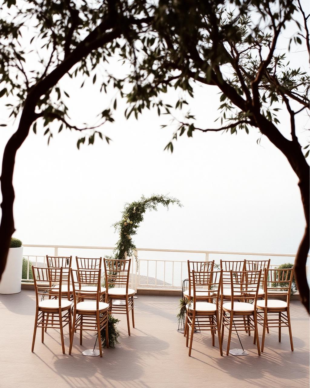 Ceremony chairs set out on a Ravello terrace above the Gulf of Salerno in late afternoon light
