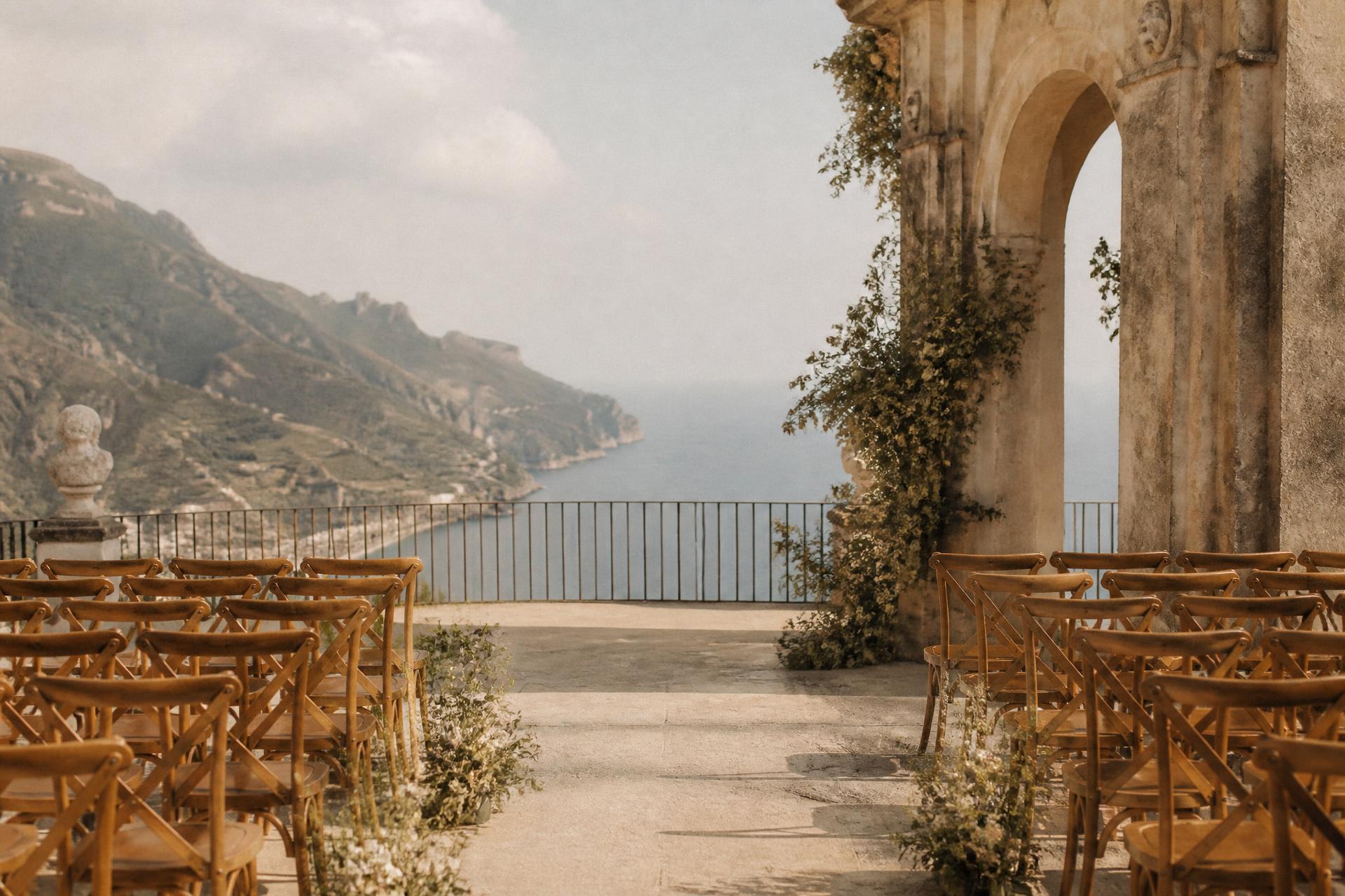 A wedding ceremony set on a Ravello terrace overlooking the Amalfi Coast